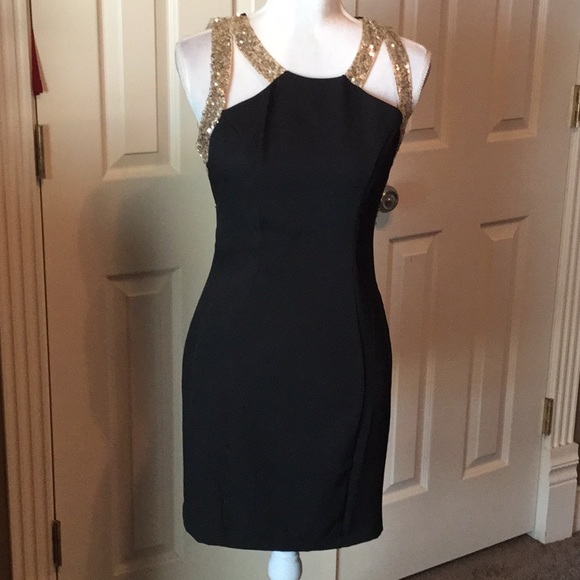 Xenia Boutique Dresses & Skirts - Beautiful NWOT Black and gold Xenia boutique dress